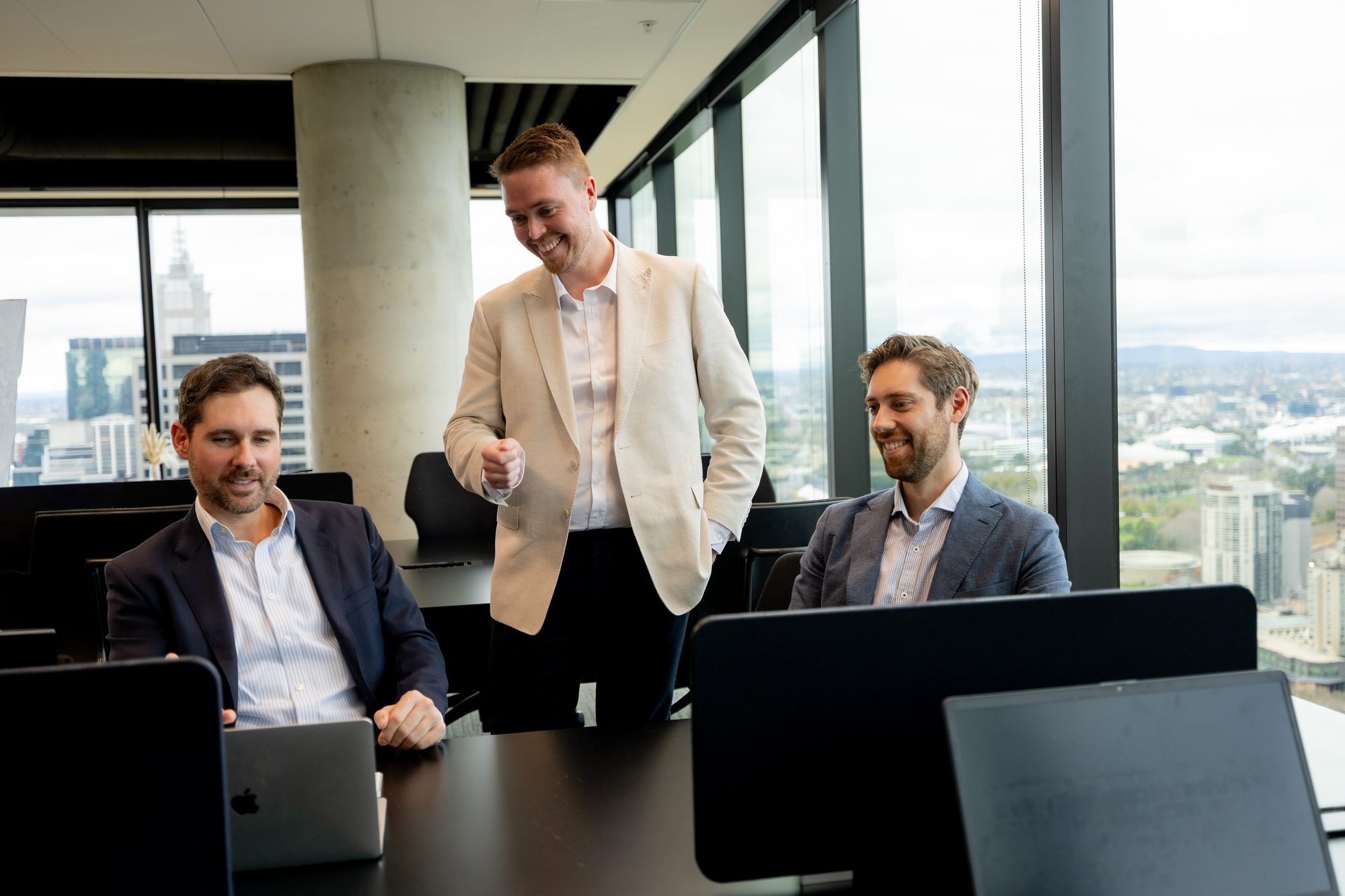 Vokke team collaborating in the Melbourne office